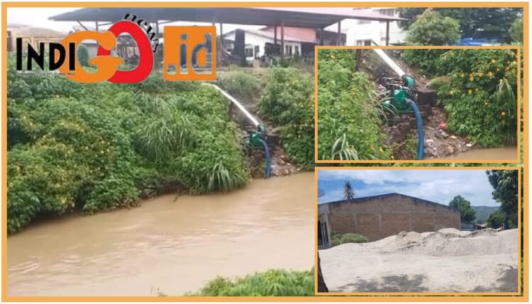 Tambang pasir ilegal dengan cara menyedot gunakan mesin dari sungai Alian Balige, Sabtu (30/9).