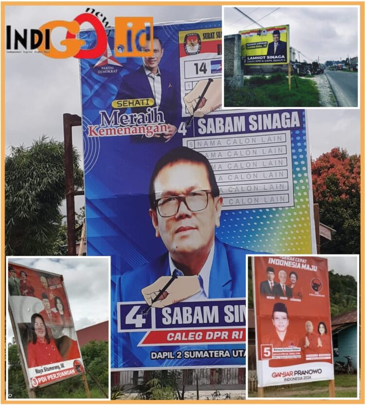 Sejumlah baliho Bacaleg yang langgar peraturan dan menyemak di Toba, Selasa (3/10).