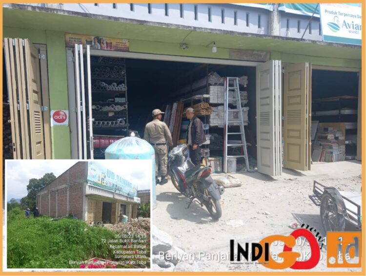 Bangunan milik UDD yang berada di sempadan sungai Alian Balige, Kamis (5/10).