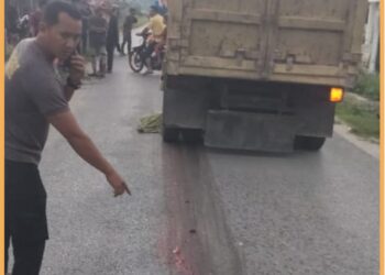 Personel Sat Lantas Polres Taput saat olah TKP, Rabu (25/10).