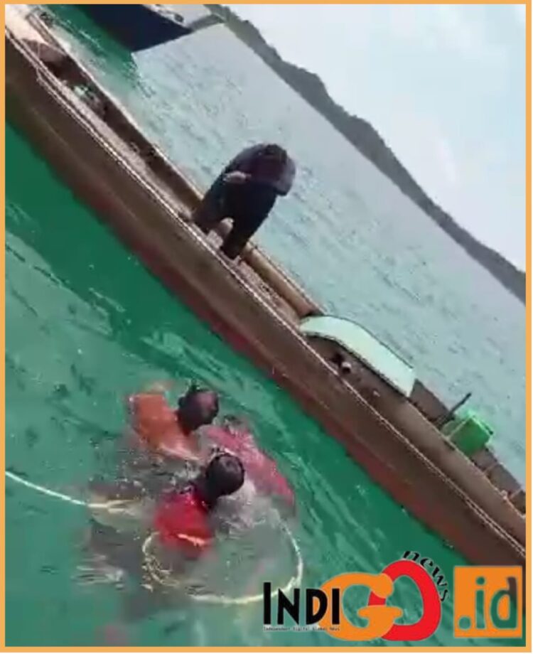 Saat evakuasi jenazah anak dibawah umur yang dipekerjakan di Kapal Pukat Bilis milik Asung, Kamis (26/10).