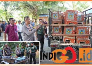 Tim gabungan saat amankan narkoba dan mesin judi di Barak Kutalimbaru - Deliserdang, Selasa (7/11).