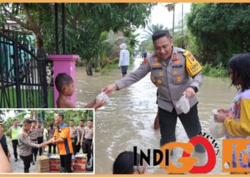 Kapolresta Deliserdang, AKBP. Raphael saat bagi bantuan, Selasa (14/11).