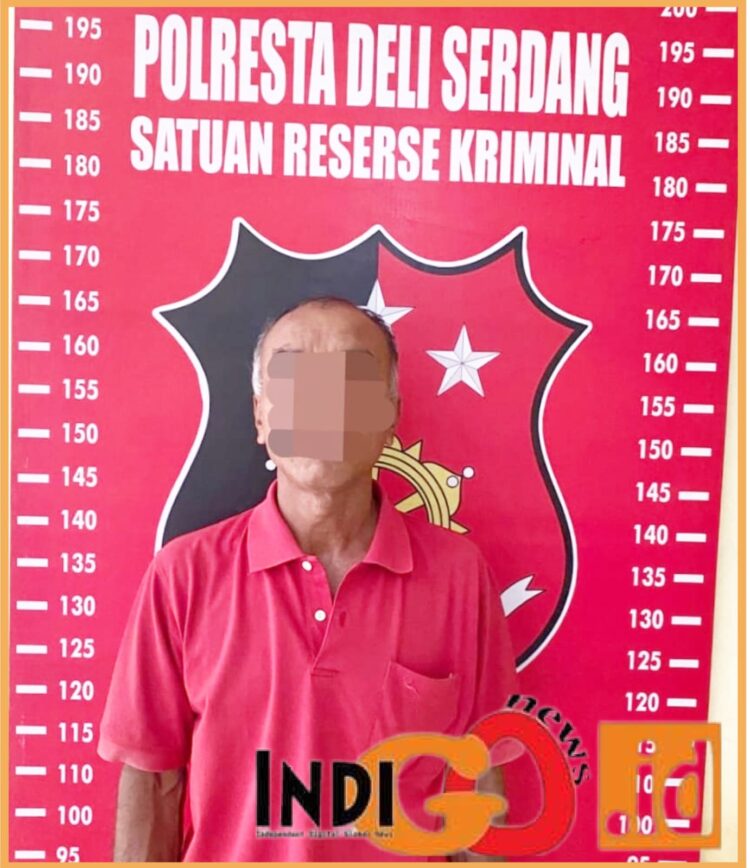 Tersangak JP saat diamankan di Mapolres Deliserdang, Rabu (13/12).