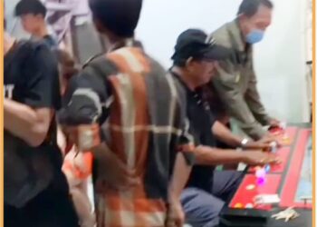Perjudian gelper tembak ikan milik, Mandoko di tenda biru dekat rel jalan Berlian Sari - Medan, Kamis (21/12).