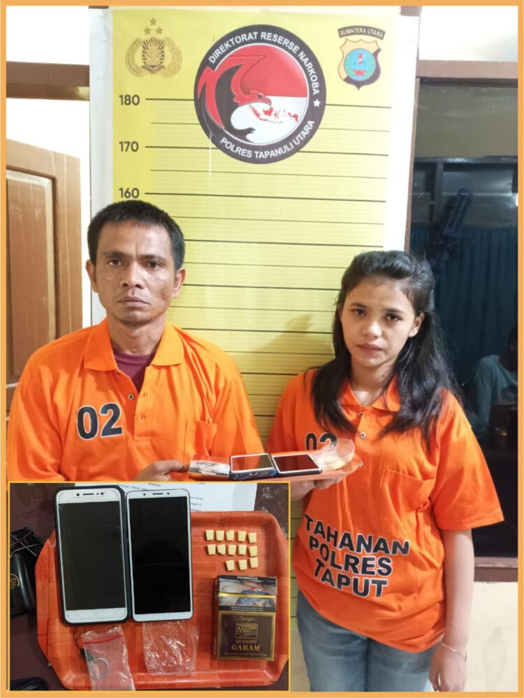 Roy Purba dan Cindy Samosir beserta 13 butir pil extacy saat diamankan di Polres Taput, Kamis (11/1).
