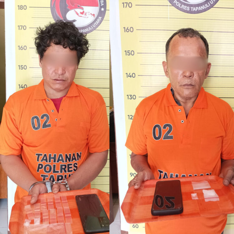 Arman Sitompul dan Malem Karina Ginting saat diamankan di Polres Taput, Minggu (14/1).