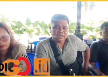 Ketua PAC IPK Kutalimbaru, Nomensen Surbakti bersama kuasa hukumnya, Kamis (24/1).