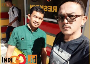 Ivan Napitupulu, perwakilan Keluarga Besar Simanjuntak bersama reporter Indigonews, Sabtu (24/2).