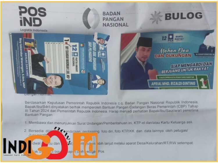 Surat undangan penerima bantuan pangan berupa cadangan beras negara yang di tempel hekter dengan kartu nama 2 Caleg PAN, Sabtu (3/2).