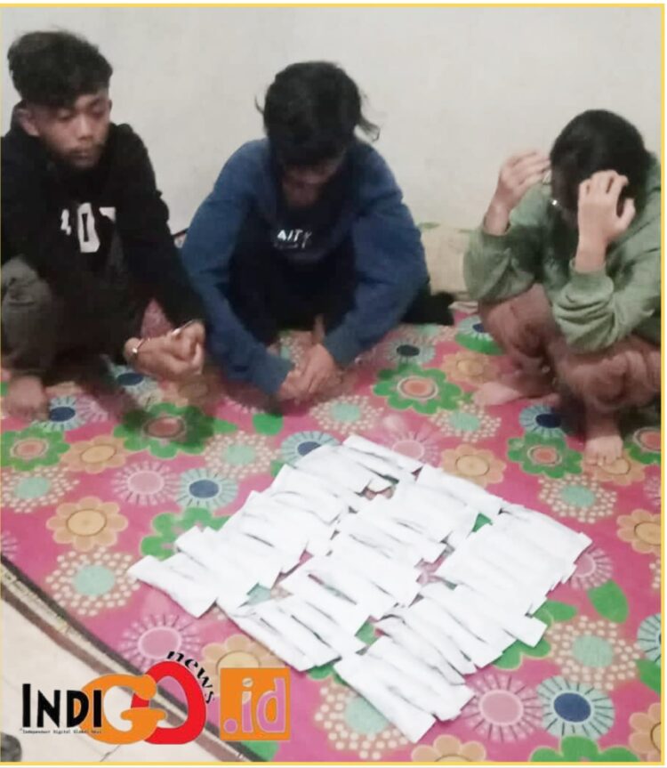 Tersangka saat diamankan di Mapolres Dairi, Jumat (15/3).