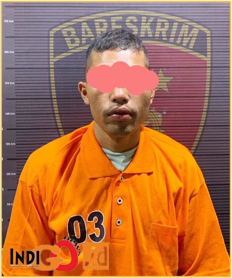 Tersangka, Jati Simanjuntak saat diamankan di Mapolres Taput, Minggu (17/3).