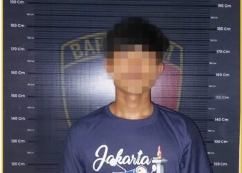 Tersangka JSS saat diamankan di Mapolres Taput, Kamis (28/3).