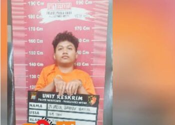 Tersangka M. Abdul Rahman Wahif alias Abdul saat diamankan di Mapolsek Medan Baru, Selasa (21/5).