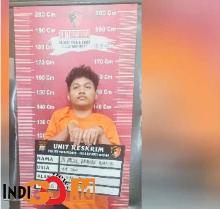 Tersangka M. Abdul Rahman Wahif alias Abdul saat diamankan di Mapolsek Medan Baru, Selasa (21/5).