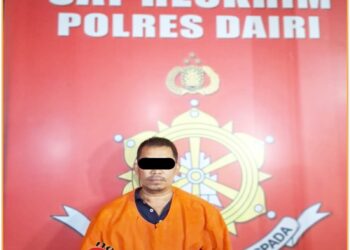 Tersangka SP, saat diamankan di Mapolres Dairi, Selasa (7/6).