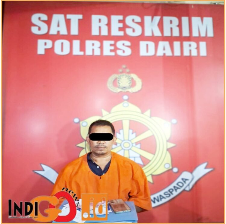 Tersangka SP, saat diamankan di Mapolres Dairi, Selasa (7/6).