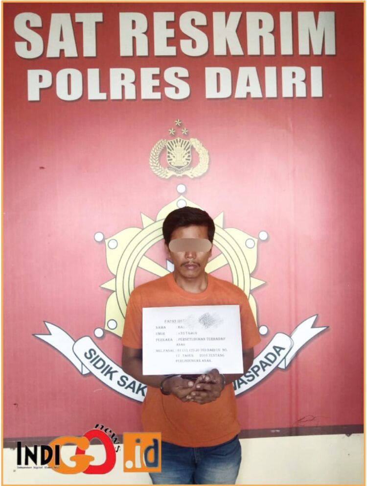 HS, pelaku persetubuhan saat diamankan di Mapolres Dairi, Kamis (20/6).