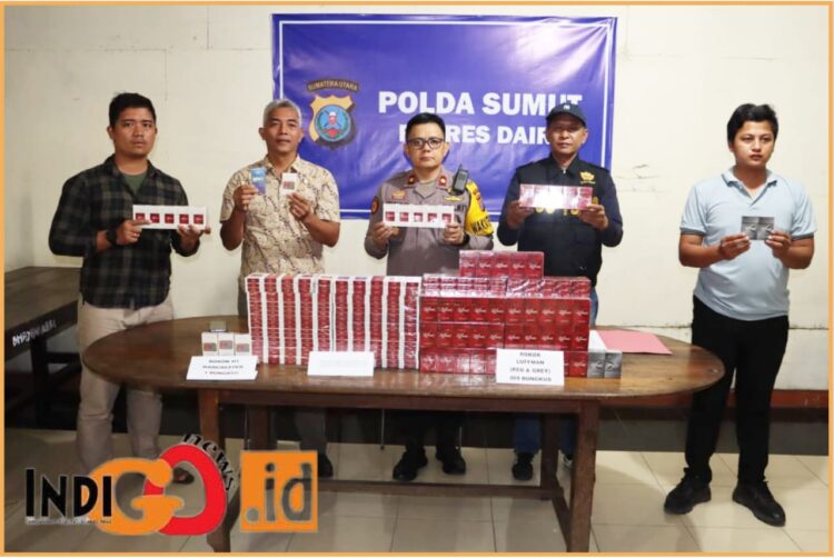 Polres Dairi dan Bea Cukai Pematangsiantar saat konferensi pers penangkapan TASS dan rokok illegal, Jumat (28/6).