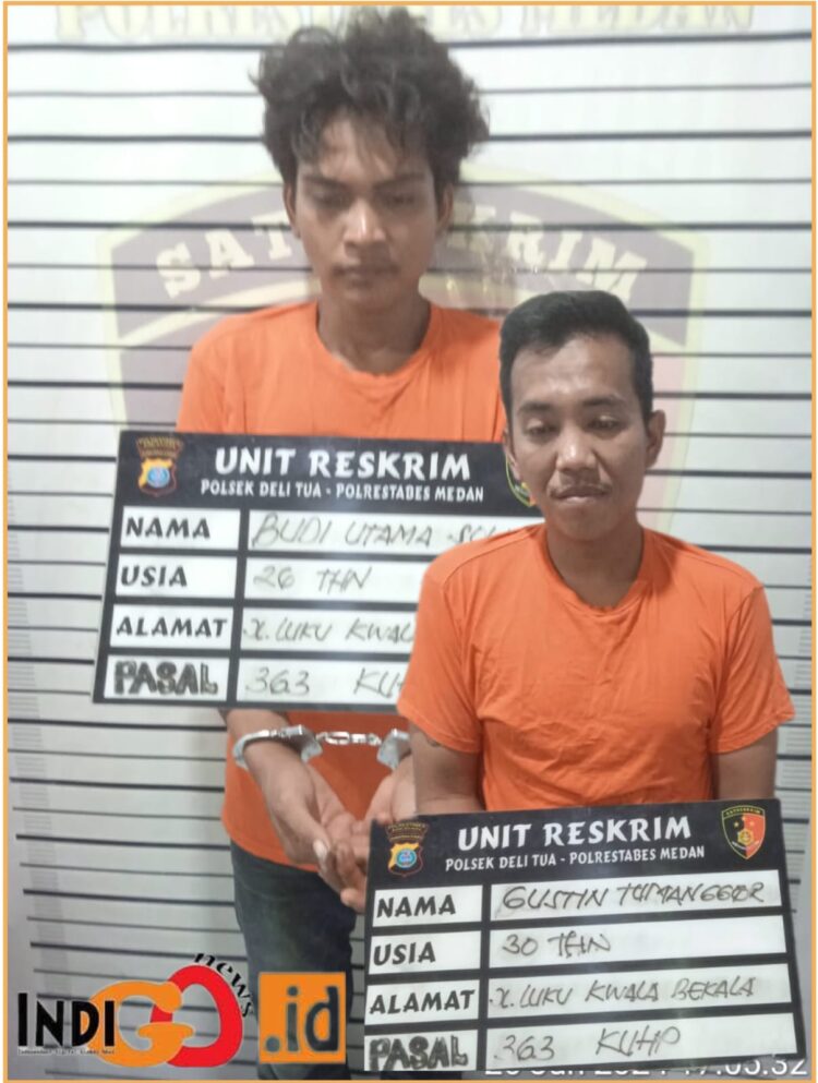 Tersanbka, Budi dan Gustin saat diamankan di Polsek Delitua, Jumat (28/6).