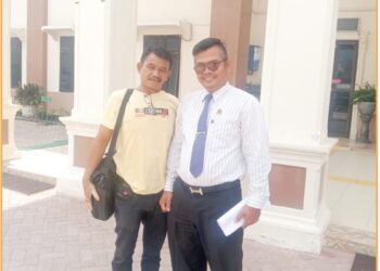 Kuasa Hukum, Hotbit Gultom SH usai putusan praperadilan bersama dengan Djonggi Napitupulu, Senin (22/7).