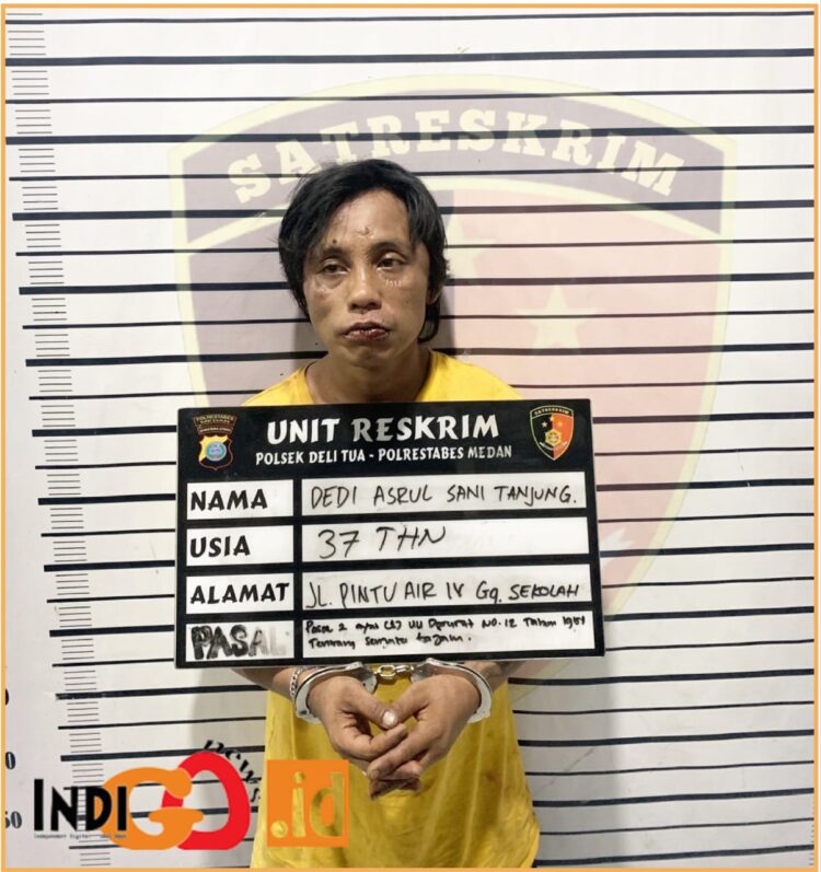 Tersangka saat diamankan di Polsek Deli Tua, Sabtu (20/7).