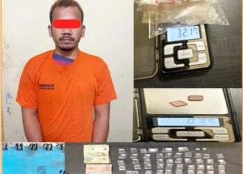 Tersangak dan barang bukti sabu saat diamankan di Polres Dairi, Rabu (24/7).
