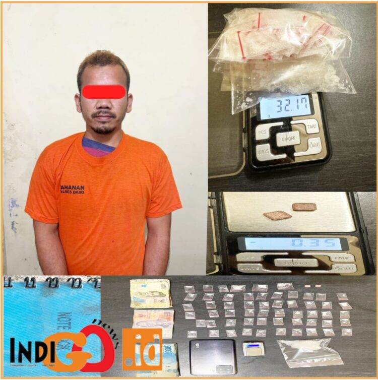 Tersangak dan barang bukti sabu saat diamankan di Polres Dairi, Rabu (24/7).