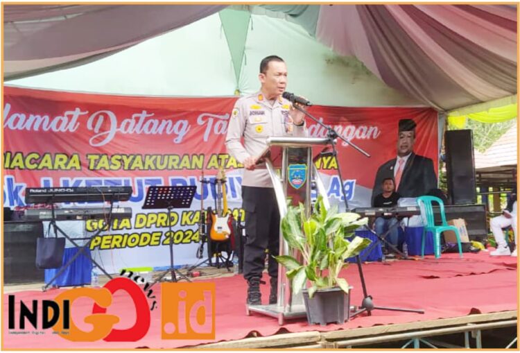 Kapolsek Belitang II, AKP. Johan Syafri SE saat menyampaikan sambutan, Minggu (1/9).