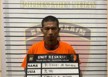 M. Fauzi alias Boneng saat diamankan Polsek Delitua, Senin (2/9).