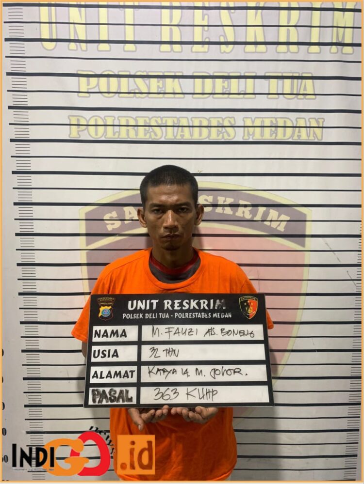 M. Fauzi alias Boneng saat diamankan Polsek Delitua, Senin (2/9).