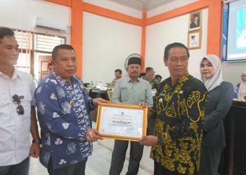 Kepala Desa Muara Gula Baru Terima Penghargaan atas Keberhasilan Melunasi PBB