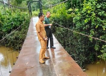 Babinsa Koramil 04/Gunung Megang Gelar Patroli Rutin di Saluran Air Desa Betung