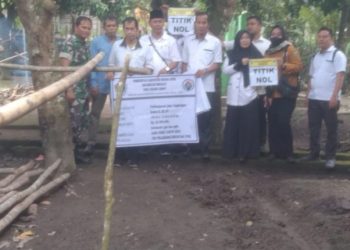 Babinsa Koramil 04/Gunung Megang Monitoring Titik Nol Pembangunan Jalan Beton Melalui Dana Desa