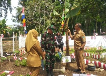Babinsa Koramil 404/Gumeg Monitoring dan Amankan Lomba Kebersihan & Tumpeng HUT RI ke-80 di Desa Gunung Megang Luar