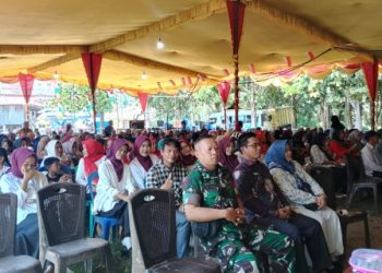 Babinsa Koramil 404-04/GM Menghadiri Puncak Perayaan HUT RI ke-80 di Desa Tanjung Muning