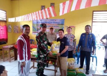 Babinsa Koramil 404-04/GM Hadiri Gerakan Pangan Murah Bulog dan TNI di Desa Rami Pasai