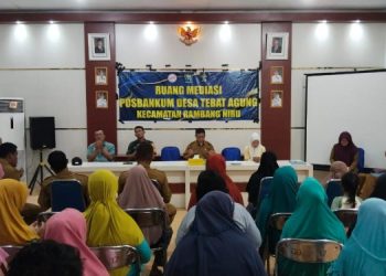 Babinsa Koramil 404-04/Gunung Megang Hadiri Pembagian BLT di Desa Tebat Agung