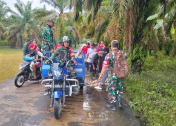 Koramil 404-04/Gumeg Laksanakan Pembersihan Sampah di Desa Gunung Megang Luar