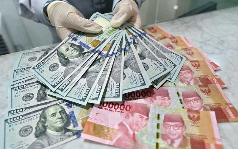Investor Masih Cemaskan Sinyak Hawkish The Fed, Simak Prediksi Rupiah Akhir Pekan Ini