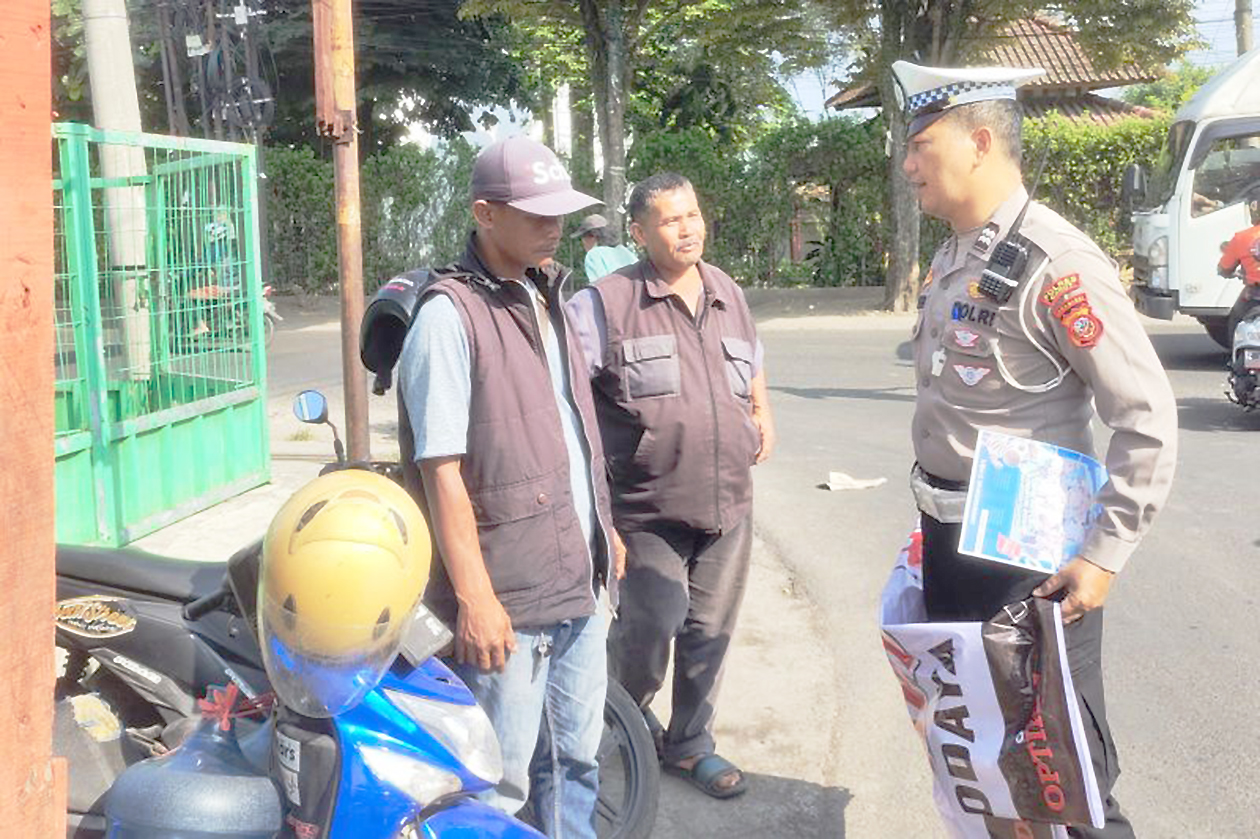 Polisi Garut Ambil Tindakan! Pengendara Merokok Langsung Dikenakan Sanksi, Denda Bisa Capai Rp750 Ribu.