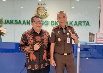 Ketua Umum SMSI Pusat, Firdaus dan Kajati DKI Jakarta, Reda Manthovani.