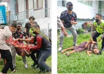 Kasat Reskrim AKP Banuara Manurung SH dan Kapolsek Siantar Selatan IPTU Edi Saragih saat menolong Robin Simbolon untuk dibawa ke RSUD dr Djasamen Saragih