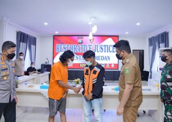 Bobby Nasution Walikota Medan menghadiri perdamaian petugas parkir di Polrestabes Medan. (Foto Ist)