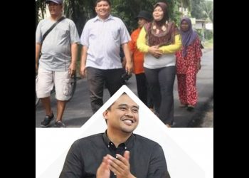 Warga Jalan Petunia 3 berkeliling karena jalannya telah diaspal. (Foto Ist)