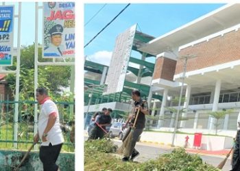Suwarno Dirut PUD Pasar saat lakukan aksi gotong royong bersama staf di Pasar Aksara, Jalan Mesjid, Medan Estate. (Foto Romulo)