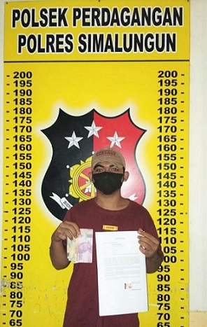 Pelaku Pungli, Kevin Imanuel Pasaribu dan barang bukti