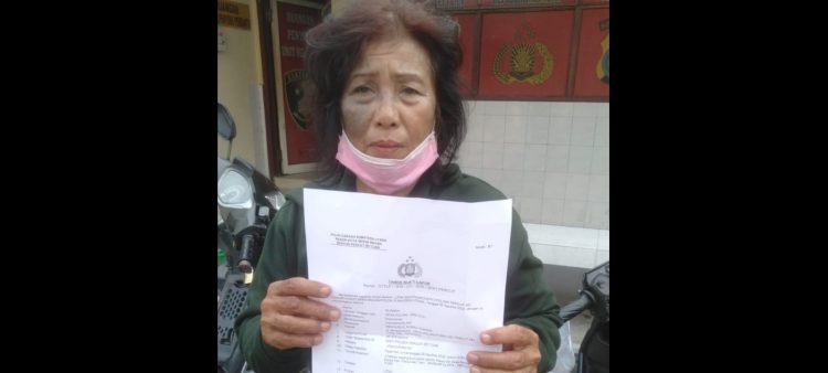 Rusnah usai membuat laporan di Polsek Percut Sei Tuan. (Foto/ist)