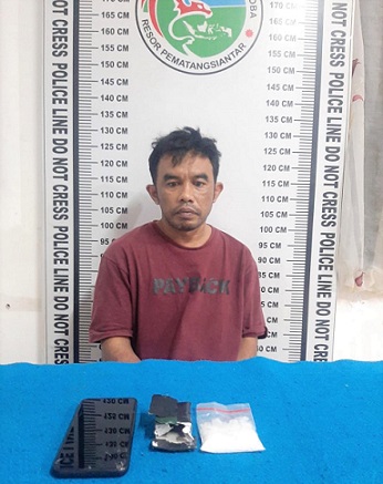Pelaku Kaharuddin Ginting dan barang bukti