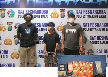 Pelaku Ronal Prayoga Tambunan diapit polisi dan barang bukti